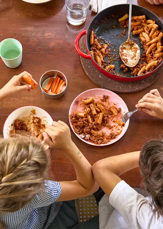 Family enjoying a pasta dinner together