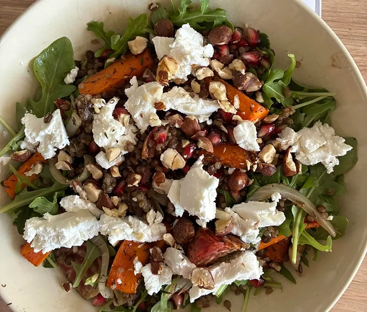 A healthy salad recipe with vibrant fresh vegetables, prepared from a Mindful Chef recipe box.