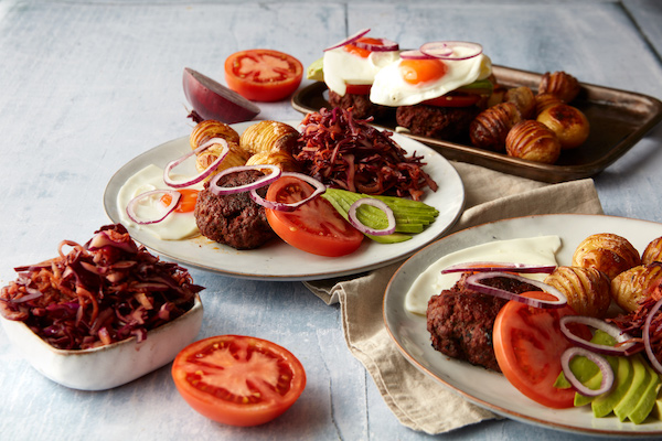 Naked beef burger, slaw, and hasselbacks